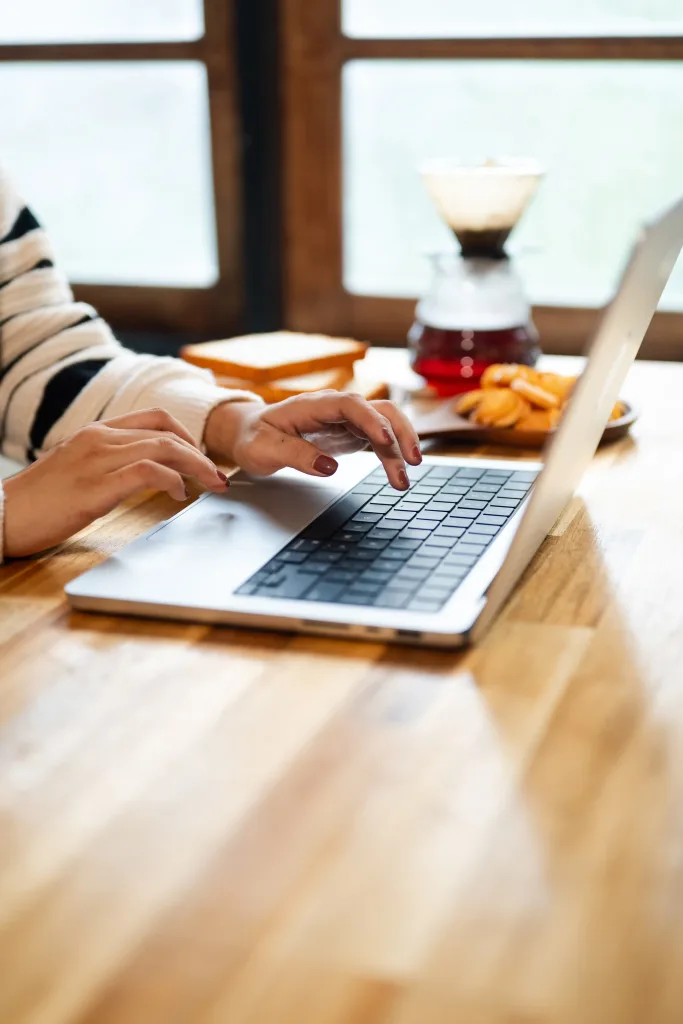 Web developer checking website updates, security and performance on a computer screen